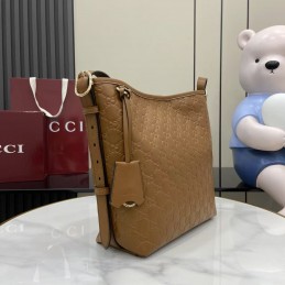 GG Emblem Small Bucket Bag...