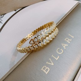 Serpenti Pave Coil Bangle...