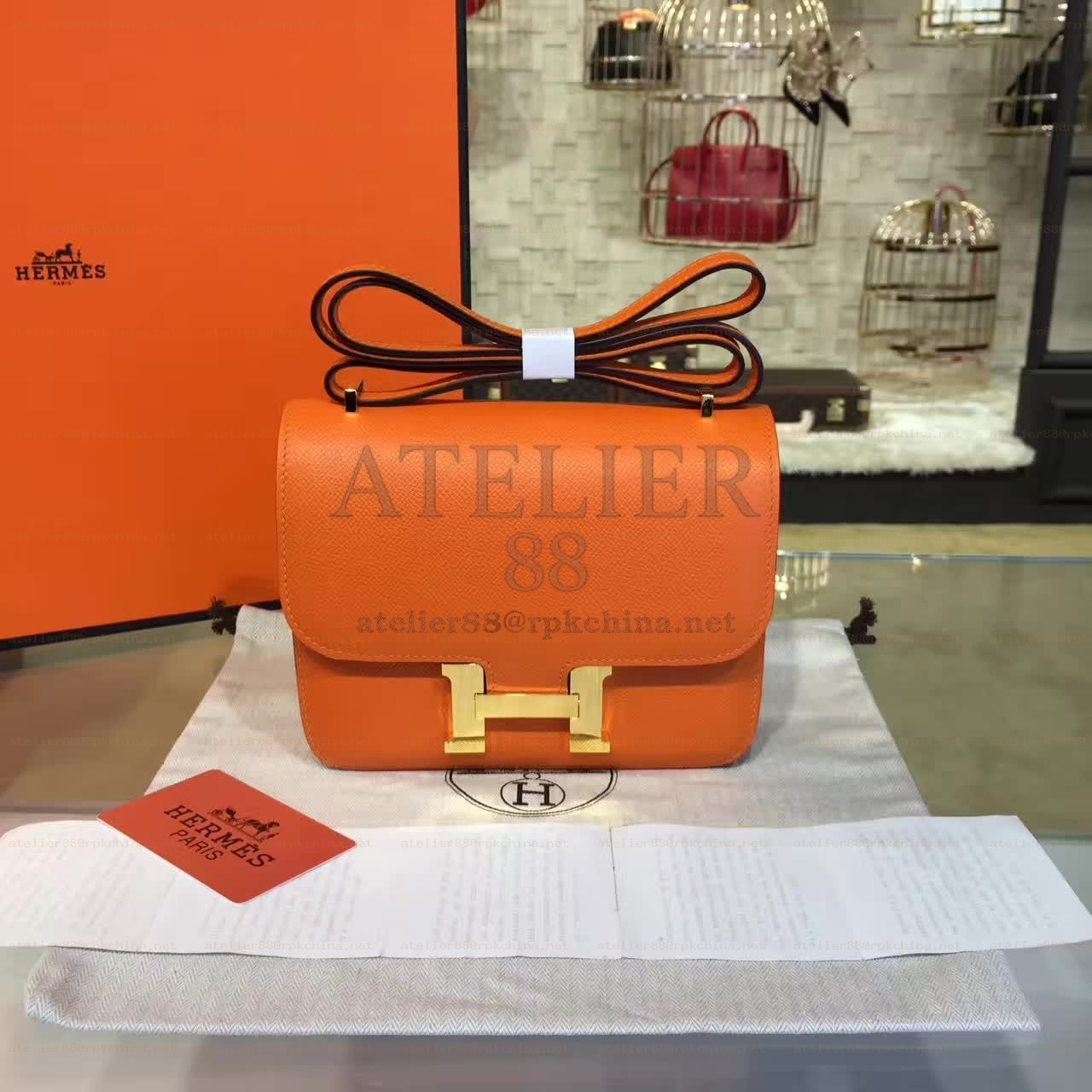 Orange Constance Mini 18 Gold Hardware Bag